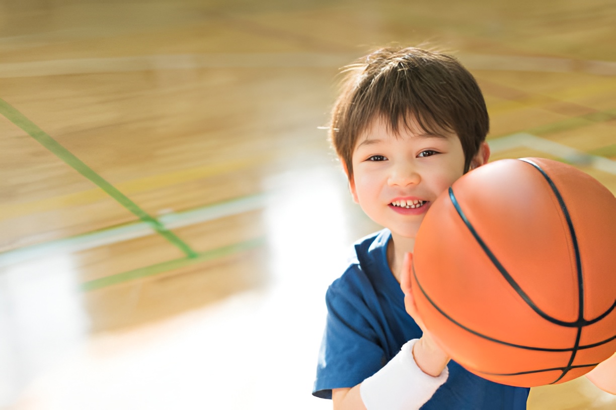 boy holding a basketball